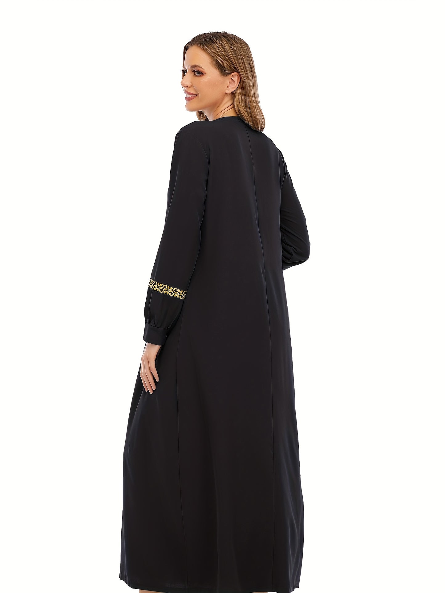 Abaya för muslimska kvinnor, med eleganta kanter.