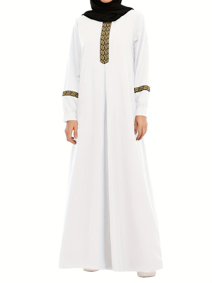 Abaya för muslimska kvinnor, med eleganta kanter.