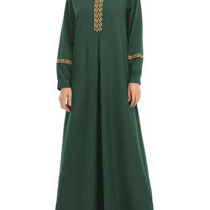 Abaya för muslimska kvinnor, med eleganta kanter.