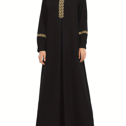 Abaya för muslimska kvinnor, med eleganta kanter.