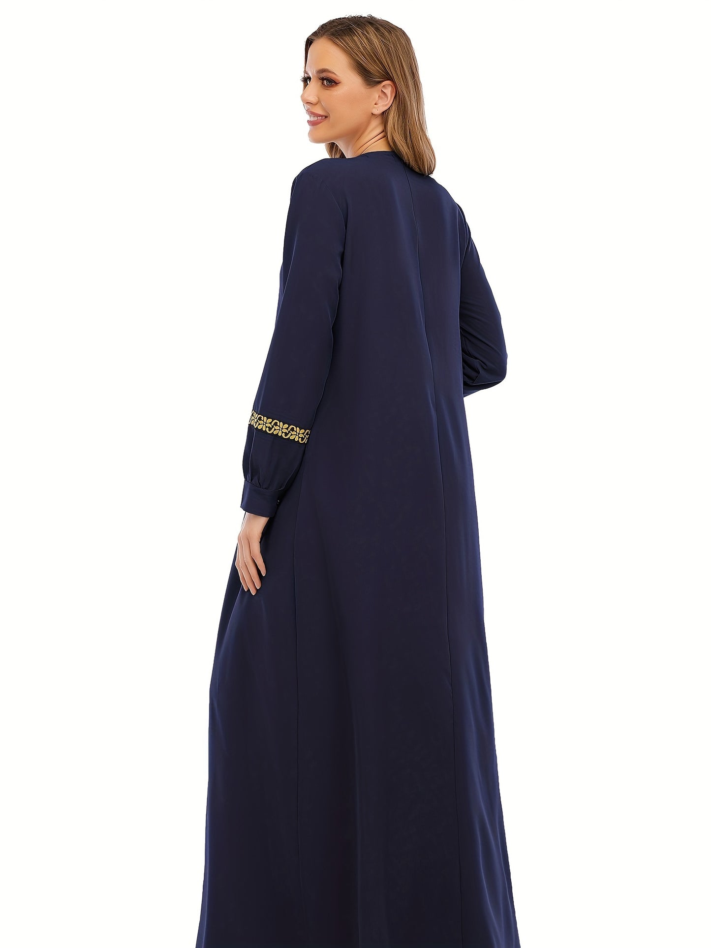 Abaya för muslimska kvinnor, med eleganta kanter.